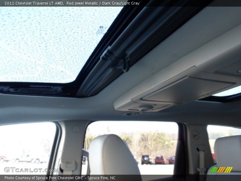 Red Jewel Metallic / Dark Gray/Light Gray 2011 Chevrolet Traverse LT AWD