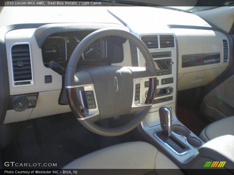 Steel Blue Metallic / Light Camel 2010 Lincoln MKX AWD