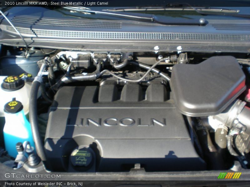 Steel Blue Metallic / Light Camel 2010 Lincoln MKX AWD
