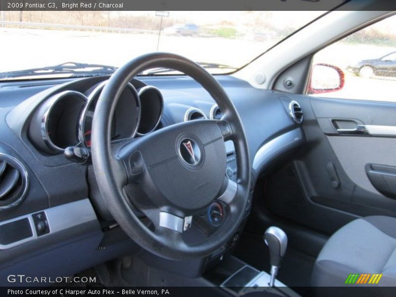 Bright Red / Charcoal 2009 Pontiac G3