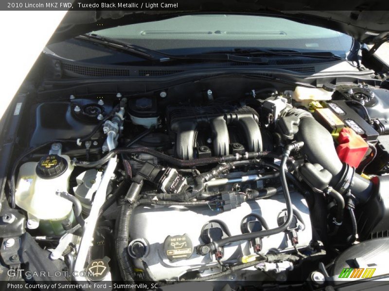 Tuxedo Black Metallic / Light Camel 2010 Lincoln MKZ FWD