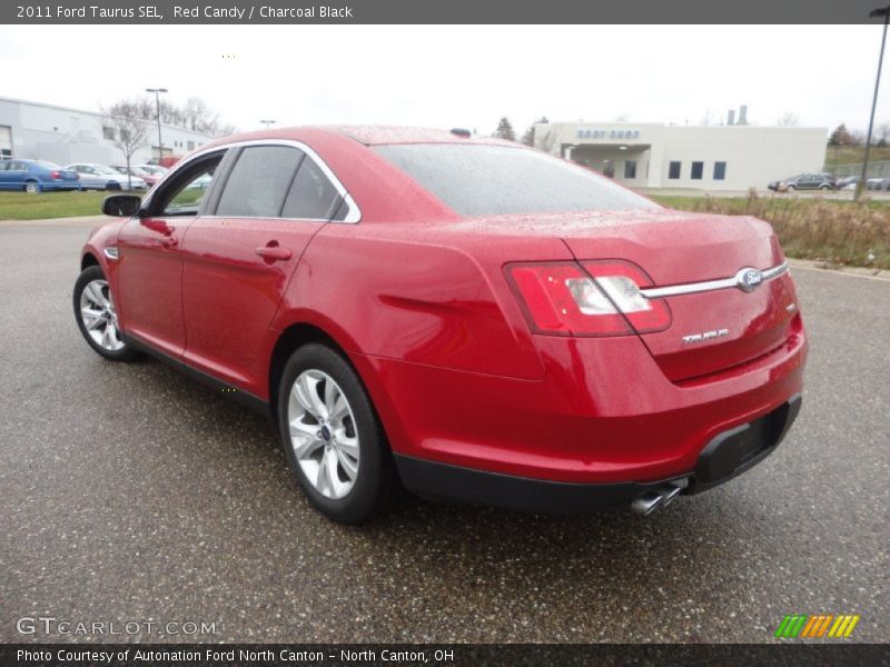 Red Candy / Charcoal Black 2011 Ford Taurus SEL