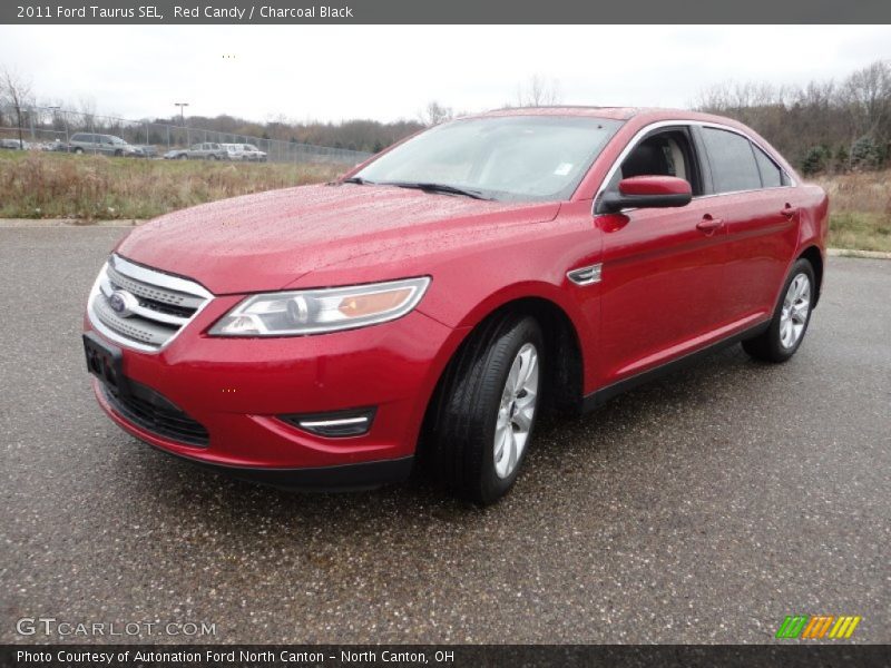 Red Candy / Charcoal Black 2011 Ford Taurus SEL