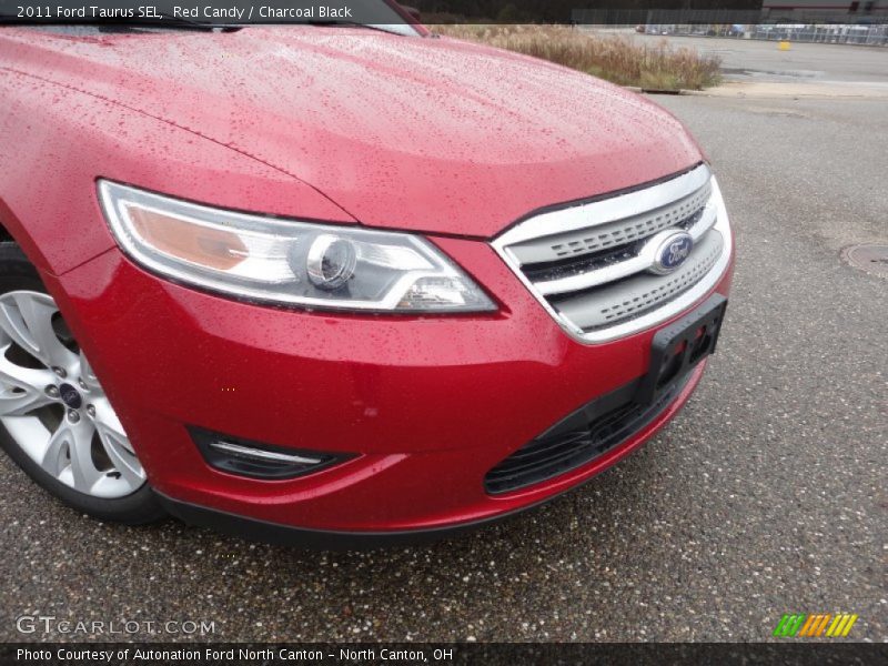 Red Candy / Charcoal Black 2011 Ford Taurus SEL