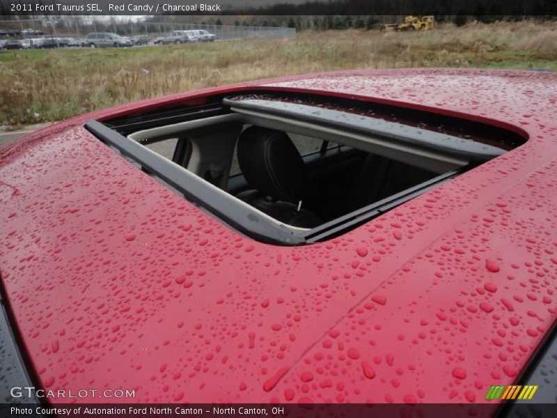 Red Candy / Charcoal Black 2011 Ford Taurus SEL