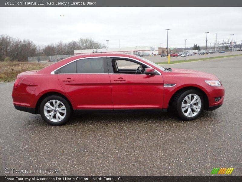 Red Candy / Charcoal Black 2011 Ford Taurus SEL