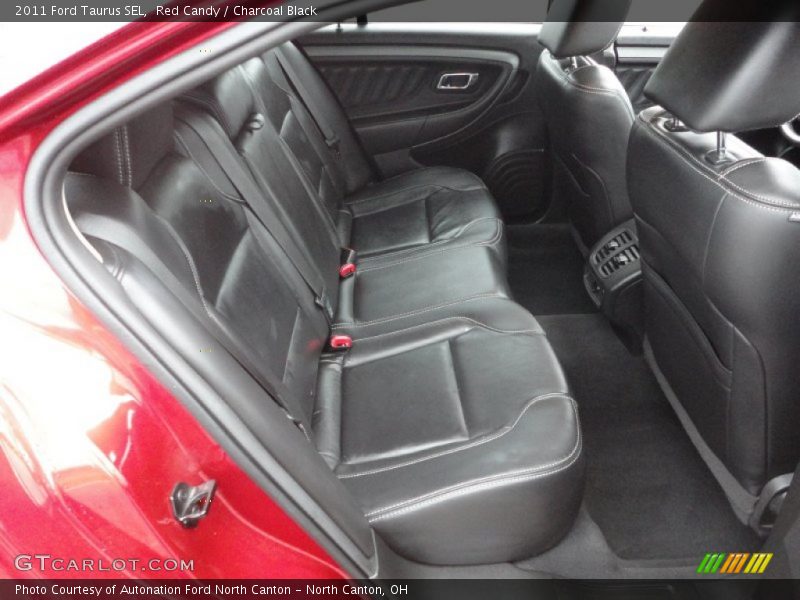 Red Candy / Charcoal Black 2011 Ford Taurus SEL