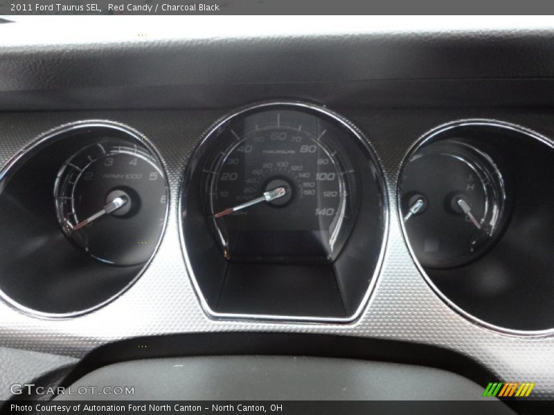 Red Candy / Charcoal Black 2011 Ford Taurus SEL