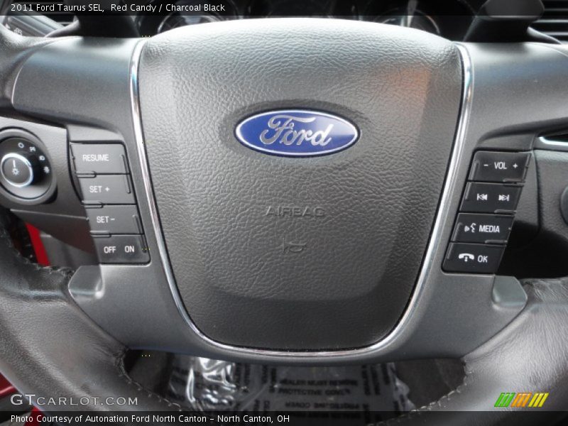 Red Candy / Charcoal Black 2011 Ford Taurus SEL