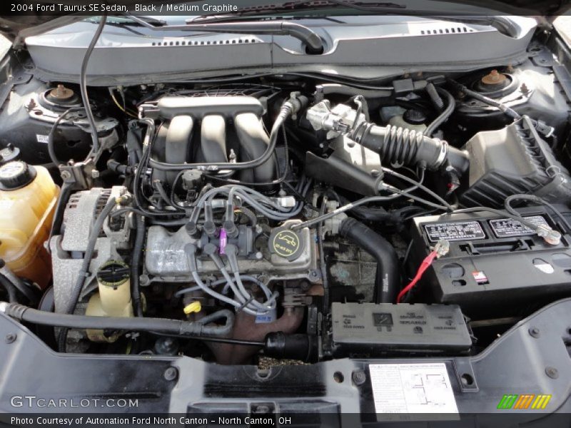 Black / Medium Graphite 2004 Ford Taurus SE Sedan
