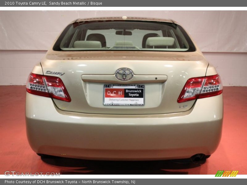 Sandy Beach Metallic / Bisque 2010 Toyota Camry LE