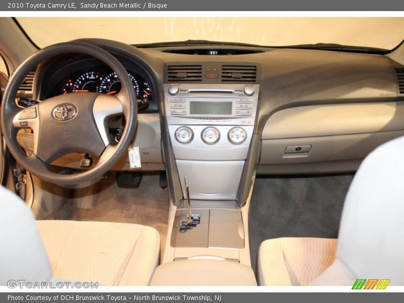 Sandy Beach Metallic / Bisque 2010 Toyota Camry LE