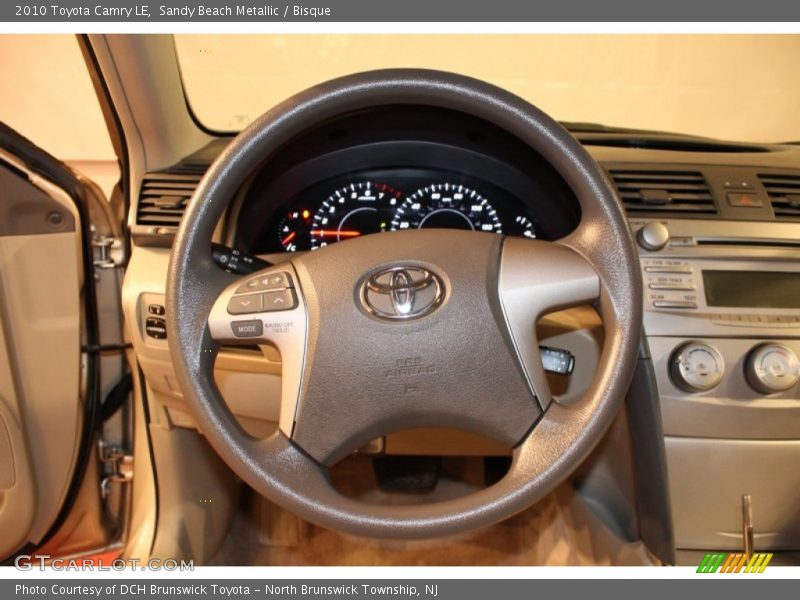 Sandy Beach Metallic / Bisque 2010 Toyota Camry LE
