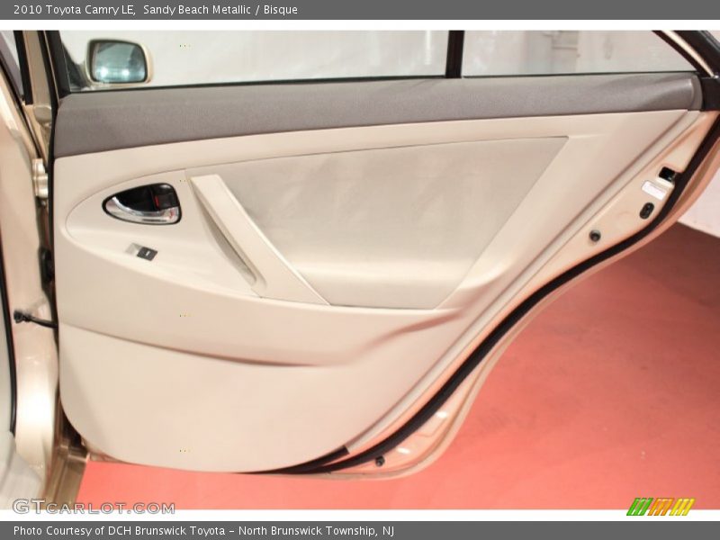 Sandy Beach Metallic / Bisque 2010 Toyota Camry LE