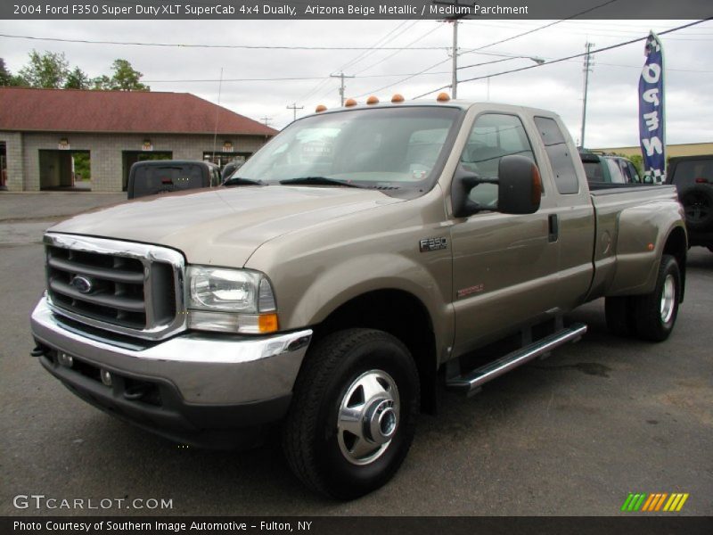 Front 3/4 View of 2004 F350 Super Duty XLT SuperCab 4x4 Dually