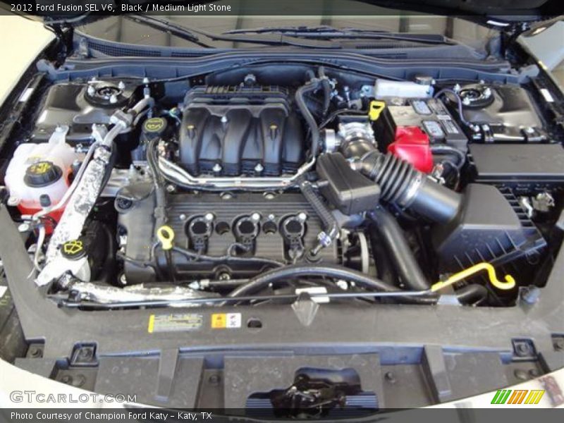 Black / Medium Light Stone 2012 Ford Fusion SEL V6