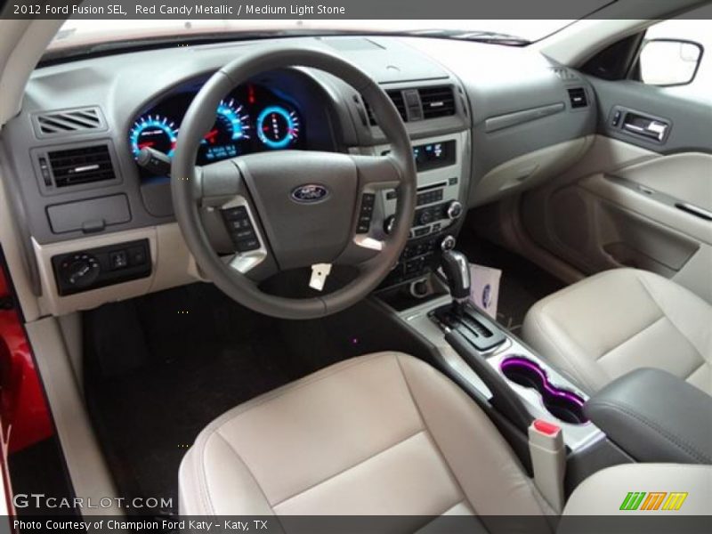 Red Candy Metallic / Medium Light Stone 2012 Ford Fusion SEL