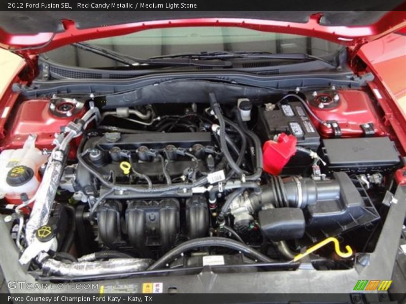 Red Candy Metallic / Medium Light Stone 2012 Ford Fusion SEL