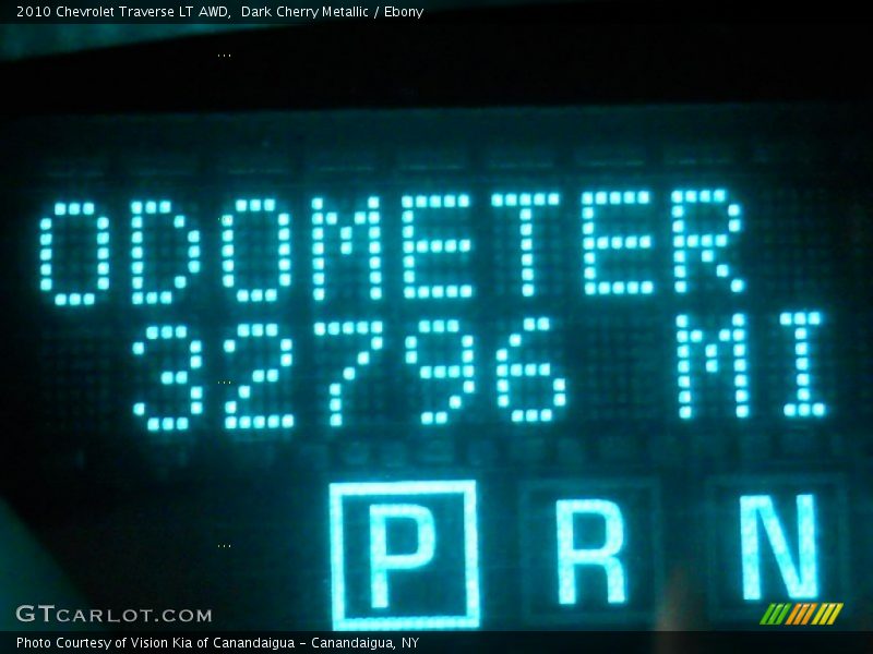 Dark Cherry Metallic / Ebony 2010 Chevrolet Traverse LT AWD