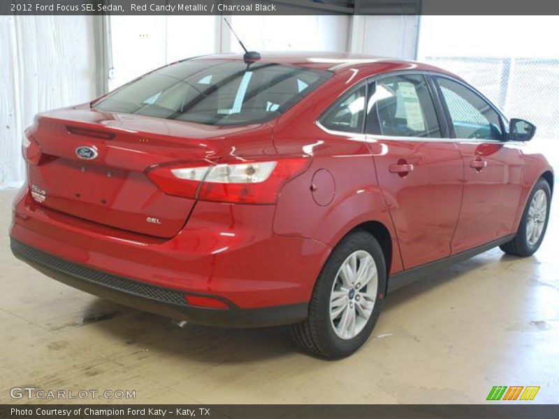 Red Candy Metallic / Charcoal Black 2012 Ford Focus SEL Sedan