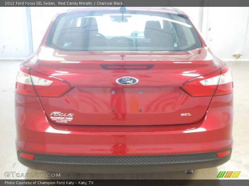 Red Candy Metallic / Charcoal Black 2012 Ford Focus SEL Sedan
