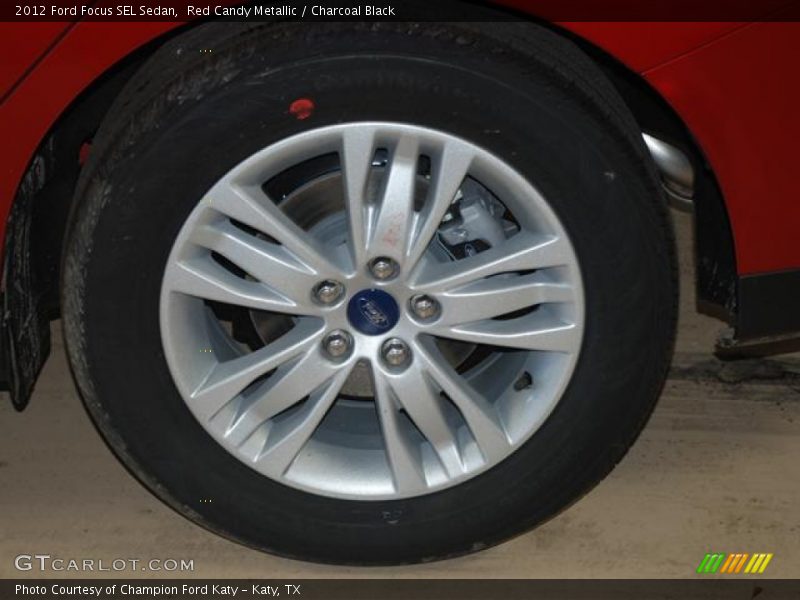 Red Candy Metallic / Charcoal Black 2012 Ford Focus SEL Sedan