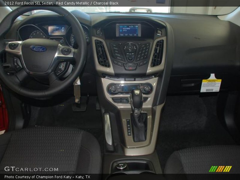 Red Candy Metallic / Charcoal Black 2012 Ford Focus SEL Sedan