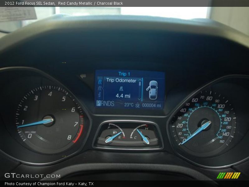 Red Candy Metallic / Charcoal Black 2012 Ford Focus SEL Sedan