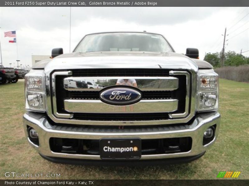 Golden Bronze Metallic / Adobe Beige 2011 Ford F250 Super Duty Lariat Crew Cab