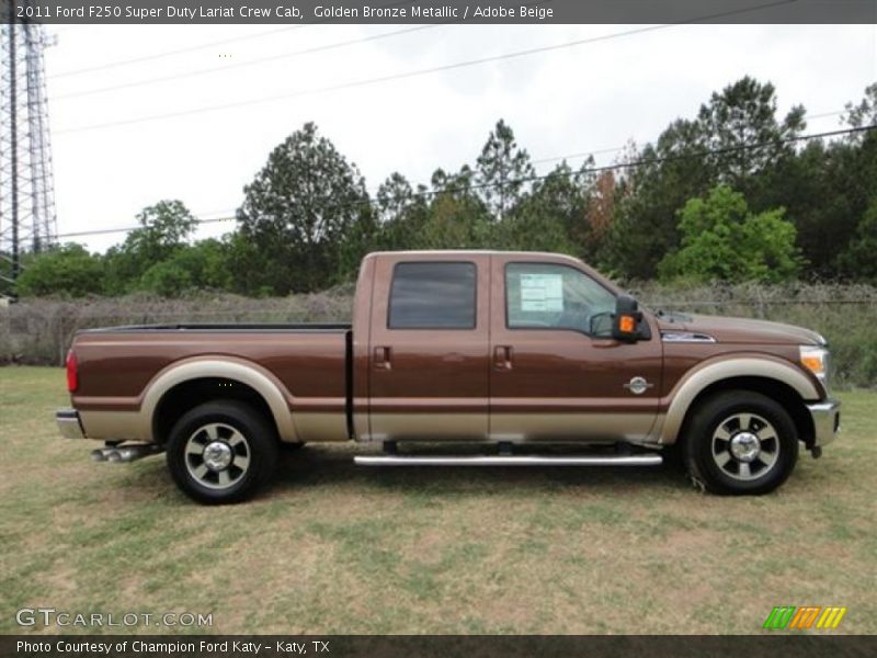 Golden Bronze Metallic / Adobe Beige 2011 Ford F250 Super Duty Lariat Crew Cab