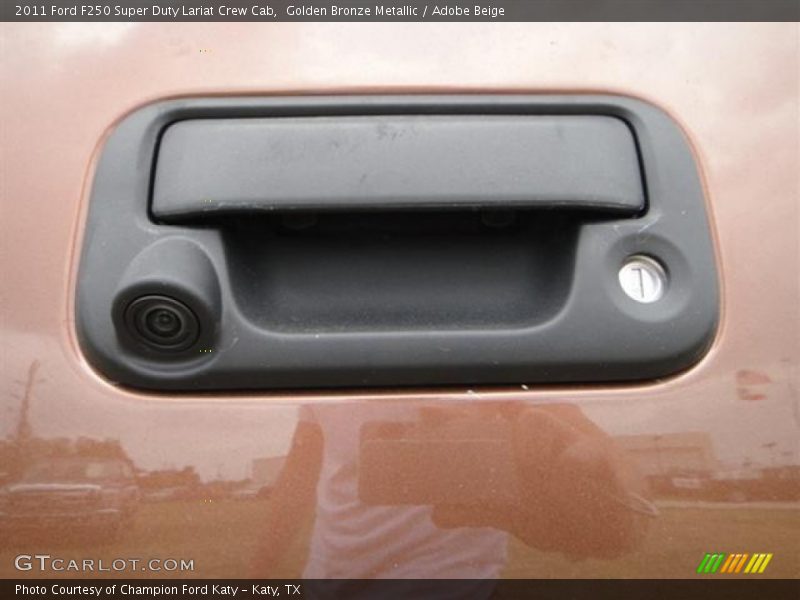 Golden Bronze Metallic / Adobe Beige 2011 Ford F250 Super Duty Lariat Crew Cab