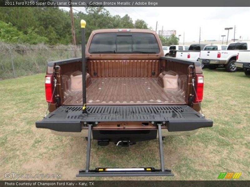Golden Bronze Metallic / Adobe Beige 2011 Ford F250 Super Duty Lariat Crew Cab
