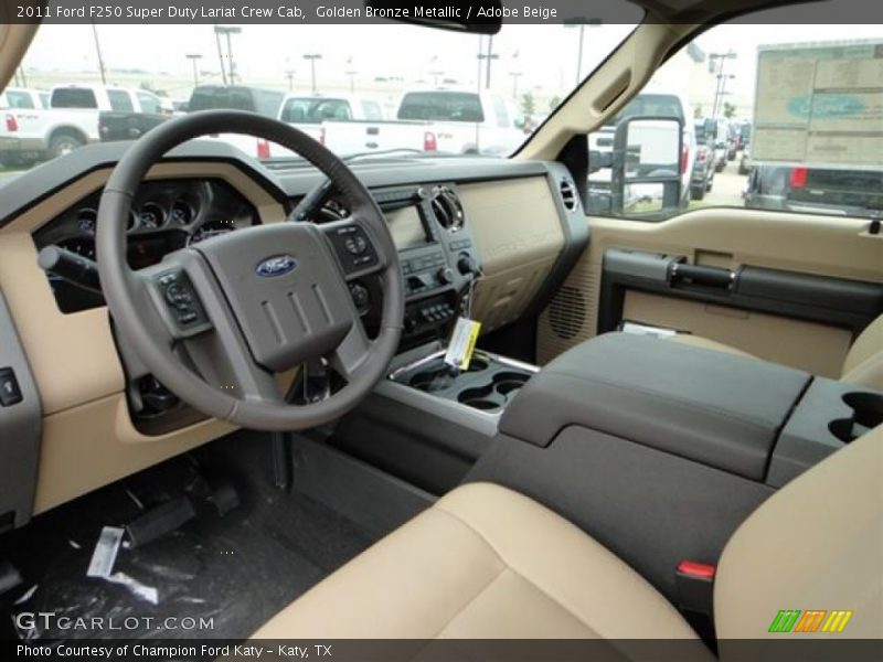 Golden Bronze Metallic / Adobe Beige 2011 Ford F250 Super Duty Lariat Crew Cab