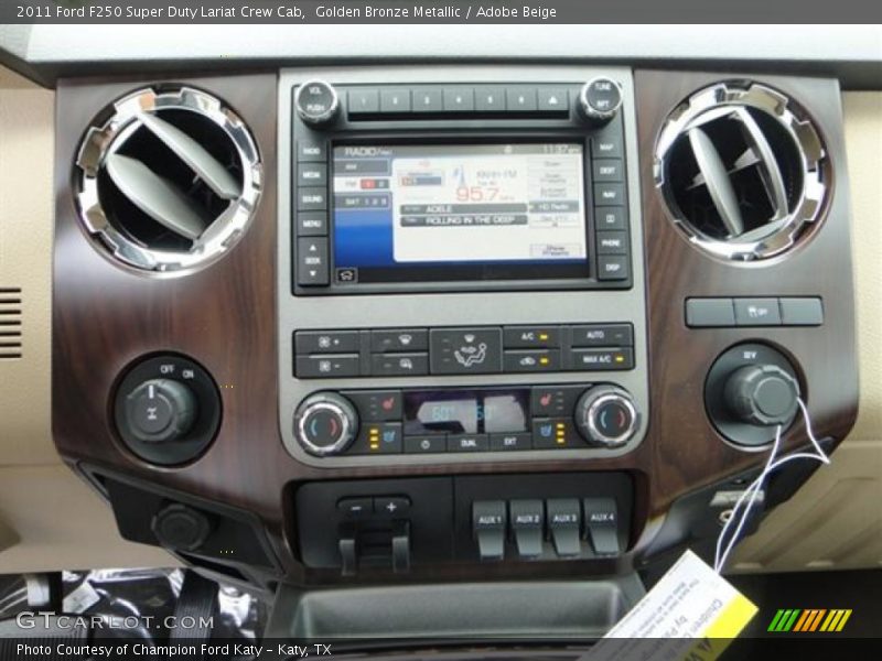 Golden Bronze Metallic / Adobe Beige 2011 Ford F250 Super Duty Lariat Crew Cab