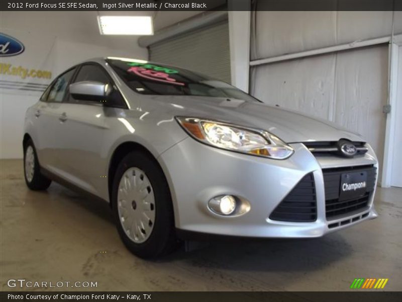 Ingot Silver Metallic / Charcoal Black 2012 Ford Focus SE SFE Sedan