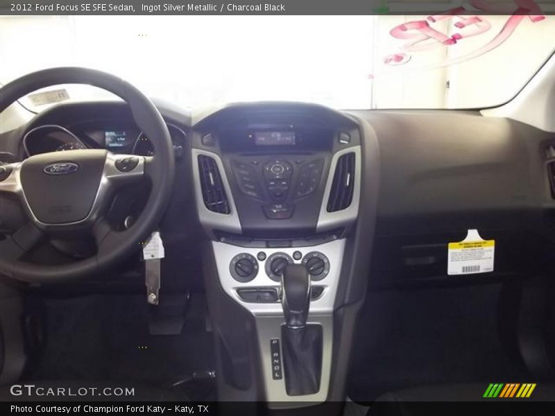 Ingot Silver Metallic / Charcoal Black 2012 Ford Focus SE SFE Sedan