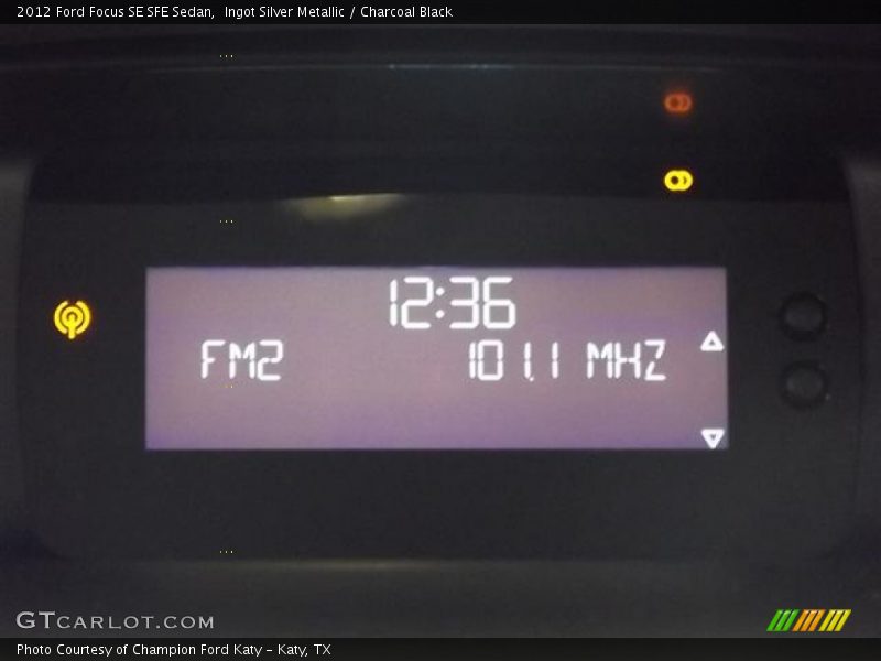 Ingot Silver Metallic / Charcoal Black 2012 Ford Focus SE SFE Sedan