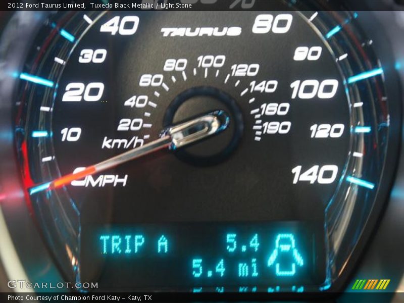 Tuxedo Black Metallic / Light Stone 2012 Ford Taurus Limited