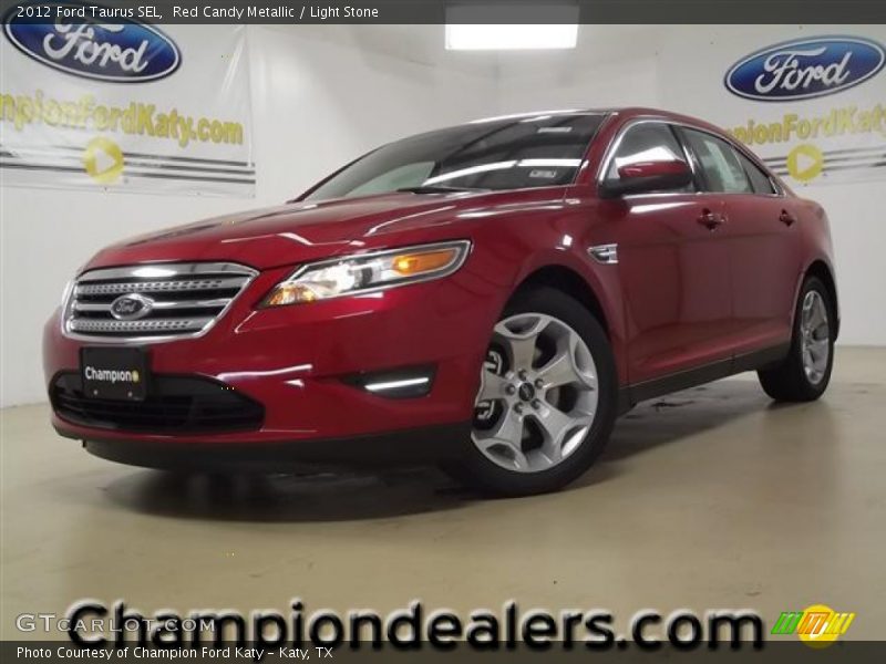 Red Candy Metallic / Light Stone 2012 Ford Taurus SEL