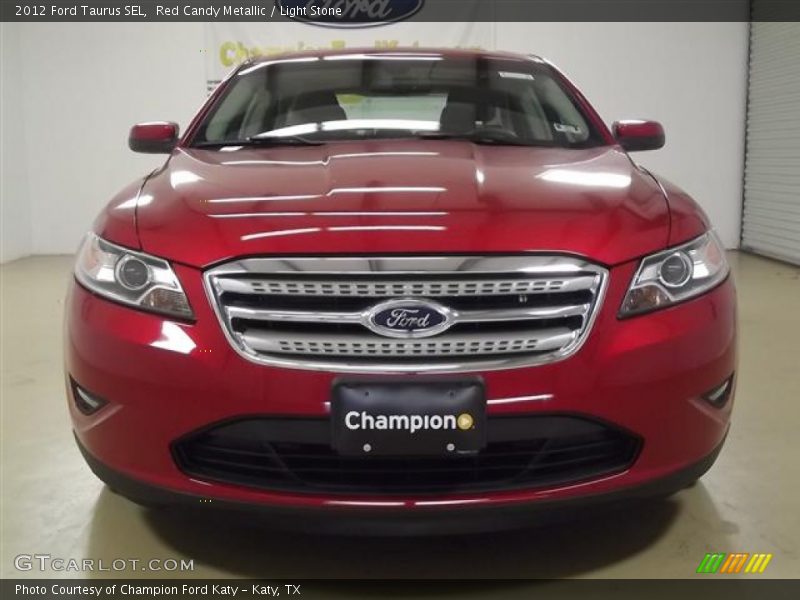 Red Candy Metallic / Light Stone 2012 Ford Taurus SEL