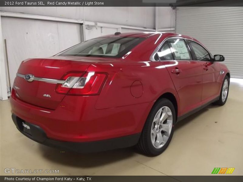 Red Candy Metallic / Light Stone 2012 Ford Taurus SEL