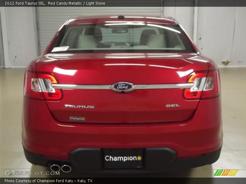 Red Candy Metallic / Light Stone 2012 Ford Taurus SEL