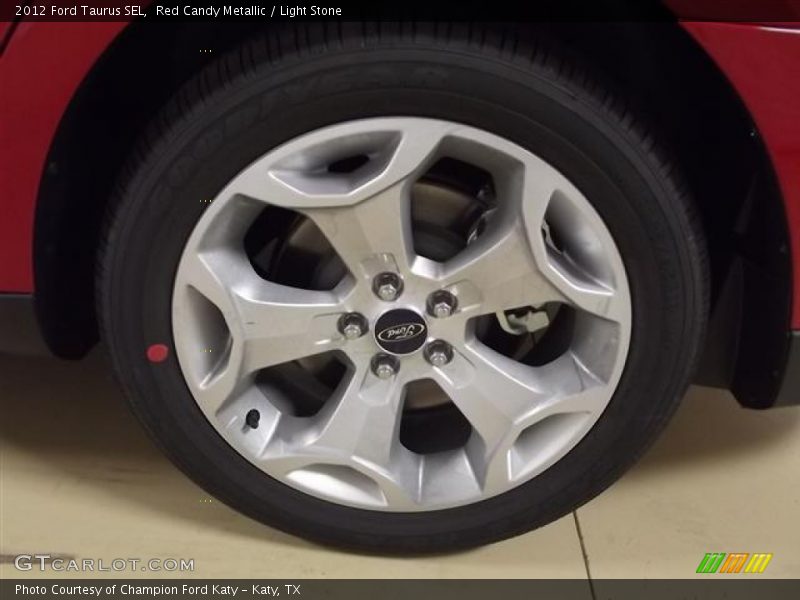 Red Candy Metallic / Light Stone 2012 Ford Taurus SEL