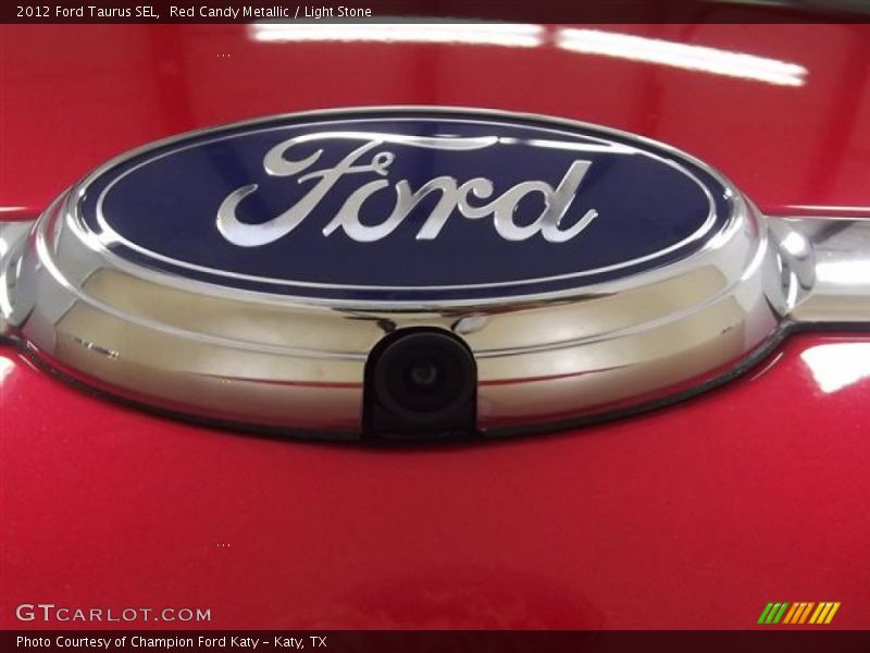 Red Candy Metallic / Light Stone 2012 Ford Taurus SEL