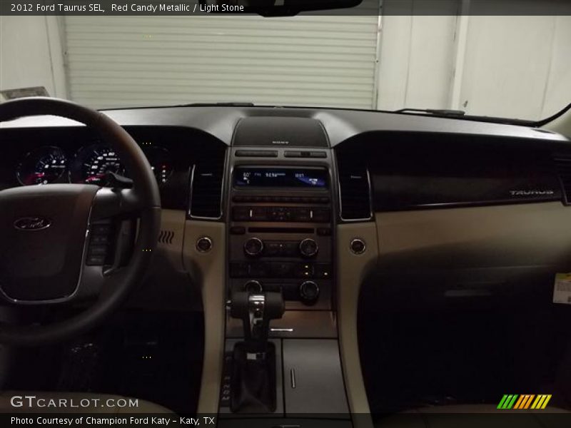 Red Candy Metallic / Light Stone 2012 Ford Taurus SEL