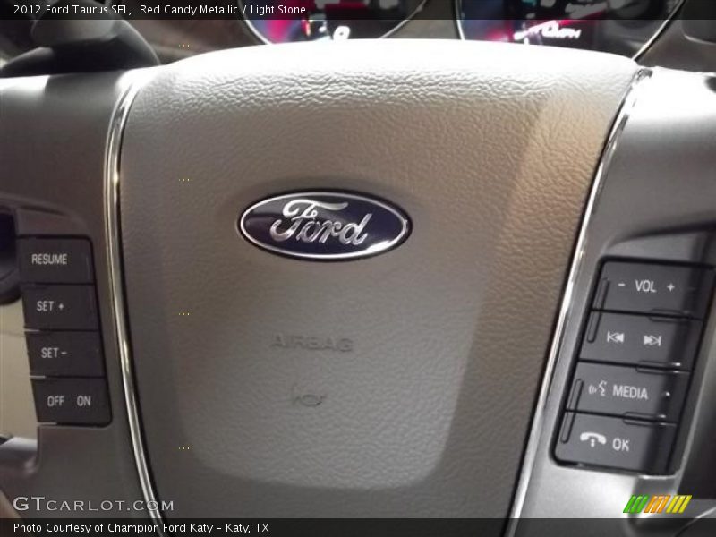 Red Candy Metallic / Light Stone 2012 Ford Taurus SEL