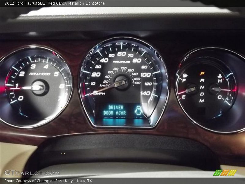 Red Candy Metallic / Light Stone 2012 Ford Taurus SEL