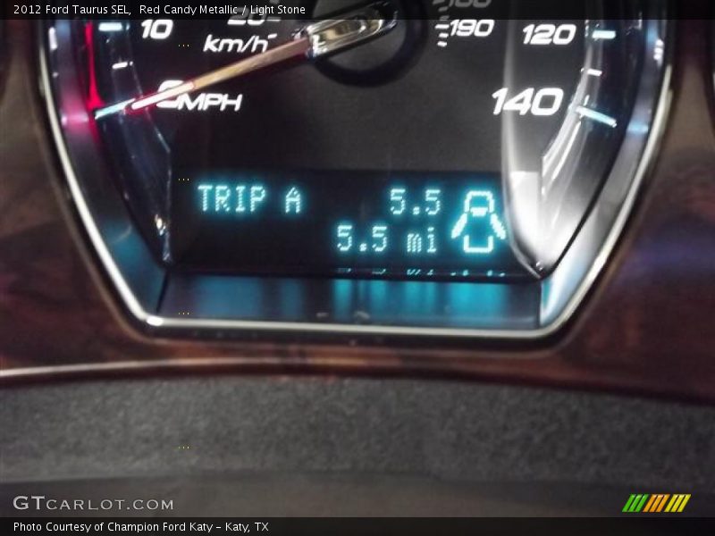 Red Candy Metallic / Light Stone 2012 Ford Taurus SEL