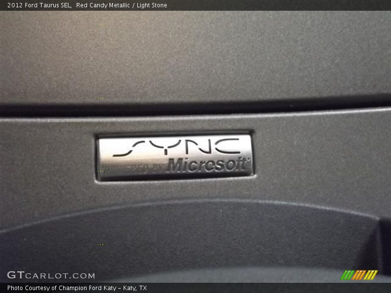 Red Candy Metallic / Light Stone 2012 Ford Taurus SEL
