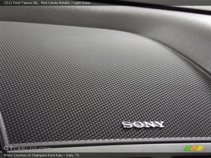 Red Candy Metallic / Light Stone 2012 Ford Taurus SEL